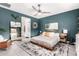 Calming main bedroom boasting stylish furnishings and a serene ambiance with neutral colors and soft textures at 3219 W Pollack St, Phoenix, AZ 85041
