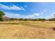 Expansive grassy area with trees and mountain views, ideal for outdoor recreation and relaxation at 3219 W Pollack St, Phoenix, AZ 85041