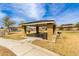 Community picnic area with shaded seating and BBQ grills for outdoor gatherings at 3219 W Pollack St, Phoenix, AZ 85041