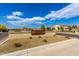 Entrance sign to the Santolina community featuring lush landscaping at 3219 W Pollack St, Phoenix, AZ 85041