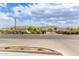 Street view featuring scenic mountain views, enhanced by desert trees, and wide roads at 3219 W Pollack St, Phoenix, AZ 85041
