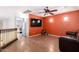 Open bonus room with ceiling fan and a view of the bedroom at 3708 S 104Th Ln, Tolleson, AZ 85353