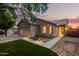 Beautiful exterior view of a cozy home with manicured lawn and charming curb appeal at 3922 N 125Th Dr, Avondale, AZ 85392
