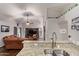 Open kitchen featuring granite countertops, stainless steel appliances, and ample counter space at 3922 N 125Th Dr, Avondale, AZ 85392