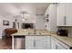 Modern kitchen with stainless steel appliances, granite countertops, and plenty of cabinet space at 3922 N 125Th Dr, Avondale, AZ 85392