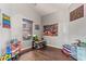 A playroom with toys, shelves, and a window at 3922 N 125Th Dr, Avondale, AZ 85392