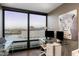 Bright office space with glass desk, mountain views, and modern decor at 4808 N 24Th St # 1424, Phoenix, AZ 85016
