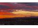 A fiery sunset over the city skyline with mountains in the distance offers great views at 4808 N 24Th St # 1424, Phoenix, AZ 85016