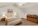Bright bedroom features vaulted ceilings, large window, carpet flooring, and a ceiling fan at 4901 S Calle Los Cerros Dr # 219, Tempe, AZ 85282