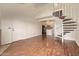Open floorplan with wood-look floors and a spiral staircase at 4901 S Calle Los Cerros Dr # 219, Tempe, AZ 85282