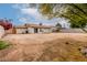 A large backyard with plenty of potential and a covered patio perfect for outdoor entertaining at 508 W Pampa Ave, Mesa, AZ 85210