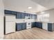 Spacious kitchen features abundant cabinetry, modern appliances, and laminate flooring at 508 W Pampa Ave, Mesa, AZ 85210