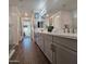 Elegant bathroom featuring double sinks, quartz countertops, gray cabinets, and modern fixtures at 5100 E Rancho Paloma Dr # 1044, Cave Creek, AZ 85331
