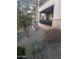 Stone accents highlight the home's exterior, surrounded by drought-tolerant landscaping and native plants at 5100 E Rancho Paloma Dr # 1044, Cave Creek, AZ 85331