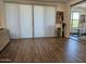 A spacious living area with wood floors, large windows, and elegant decorations create a relaxing atmosphere at 5100 E Rancho Paloma Dr # 1044, Cave Creek, AZ 85331