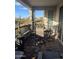 Relaxing patio with a brick floor, desert view, and an outdoor furniture set perfect for enjoying the Arizona weather at 5100 E Rancho Paloma Dr # 1044, Cave Creek, AZ 85331