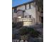 Elegant community sign with lush landscaping adds curb appeal to this well-maintained property at 5100 E Rancho Paloma Dr # 1044, Cave Creek, AZ 85331