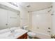 This bathroom features a vanity, mirror, toilet, and shower over tub combo at 5757 W Eugie Ave # 1080, Glendale, AZ 85304