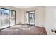 This bedroom has carpeted floors and sliding glass doors leading to the exterior at 5757 W Eugie Ave # 1080, Glendale, AZ 85304