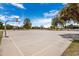 Outdoor basketball court with hoops, benches, and shaded areas at 625 S Westwood -- # 121, Mesa, AZ 85210