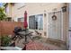 Cozy patio area with seating, table, grill, and outdoor decor at 625 S Westwood -- # 121, Mesa, AZ 85210