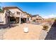 Extended paved patio, pool, lush plants and an outdoor recreation area at 639 N 110Th Pl, Mesa, AZ 85207