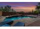 Beautiful pool with brick surround and relaxing lounge chairs, perfect for enjoying the sunset at 639 N 110Th Pl, Mesa, AZ 85207