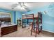 bedroom featuring bunkbeds, carpeting, and a ceiling fan at 639 N 110Th Pl, Mesa, AZ 85207