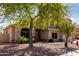 Well-kept home features desert landscaping with mature tree and plenty of curb appeal at 639 N 110Th Pl, Mesa, AZ 85207
