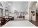 Open floor plan with dining and living spaces featuring views of the kitchen at 639 N 110Th Pl, Mesa, AZ 85207