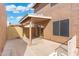 View of a backyard featuring a covered patio and artificial turf at 6811 W Aire Libre Ave, Peoria, AZ 85382