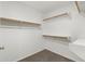 Walk-in closet offering generous storage with shelving and rods for optimal organization at 6811 W Aire Libre Ave, Peoria, AZ 85382