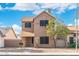 Inviting two-story home featuring a well-maintained facade and a charming front yard with desert landscaping at 6811 W Aire Libre Ave, Peoria, AZ 85382