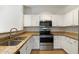 Kitchen featuring stainless steel appliances and granite counters at 6811 W Aire Libre Ave, Peoria, AZ 85382
