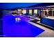 The backyard features a pool, patio, hot tub, and outdoor seating providing an oasis for relaxation at 7158 E Posada Ave, Mesa, AZ 85212