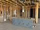 A partially finished kitchen reveals the plumbing, electrical, and framework soon to be a modern kitchen at 7707 W Avenida Del Rey --, Peoria, AZ 85383