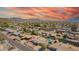 Panoramic aerial view of a residential area, showcasing a property with a private backyard pool, patio, and lush greenery at 809 N 95Th St, Mesa, AZ 85207