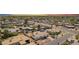 Expansive aerial view of a desert neighborhood with single-story homes and mature landscaping at 809 N 95Th St, Mesa, AZ 85207