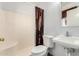 Functional bathroom features a shower, toilet, and sink at 809 N 95Th St, Mesa, AZ 85207