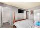 Cozy bedroom with a four poster bed and attached bath at 809 N 95Th St, Mesa, AZ 85207
