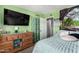 Neutral bedroom with green walls and soft bedding at 809 N 95Th St, Mesa, AZ 85207