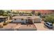 Charming single-story home featuring desert landscaping, a covered front porch, and a two-car garage at 809 N 95Th St, Mesa, AZ 85207