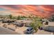 Inviting single-story home with well-kept landscaping, a covered porch, and a convenient driveway for parking at 809 N 95Th St, Mesa, AZ 85207