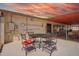 Cozy patio area with outdoor seating, perfect for relaxation and entertaining by the pool at 809 N 95Th St, Mesa, AZ 85207