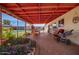 Outdoor patio with garden area and pool views at 809 N 95Th St, Mesa, AZ 85207