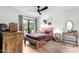 Stylish bedroom featuring hardwood floors and unique decor at 8754 E Via De Sereno --, Scottsdale, AZ 85258