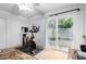 Bedroom with a Peloton exercise bike and access to a private outdoor patio through sliding glass doors at 8754 E Via De Sereno --, Scottsdale, AZ 85258