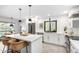 Bright, modern kitchen with white cabinetry, stainless steel appliances, and a large island at 8754 E Via De Sereno --, Scottsdale, AZ 85258