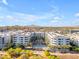 Stunning community with a pool, palm trees, and manicured landscape, ideal for modern living at 945 E Playa Del Norte Dr # 4017, Tempe, AZ 85288