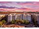 Exterior aerial view of the condo complex showcasing its modern architecture and well-maintained surroundings at 945 E Playa Del Norte Dr # 4017, Tempe, AZ 85288